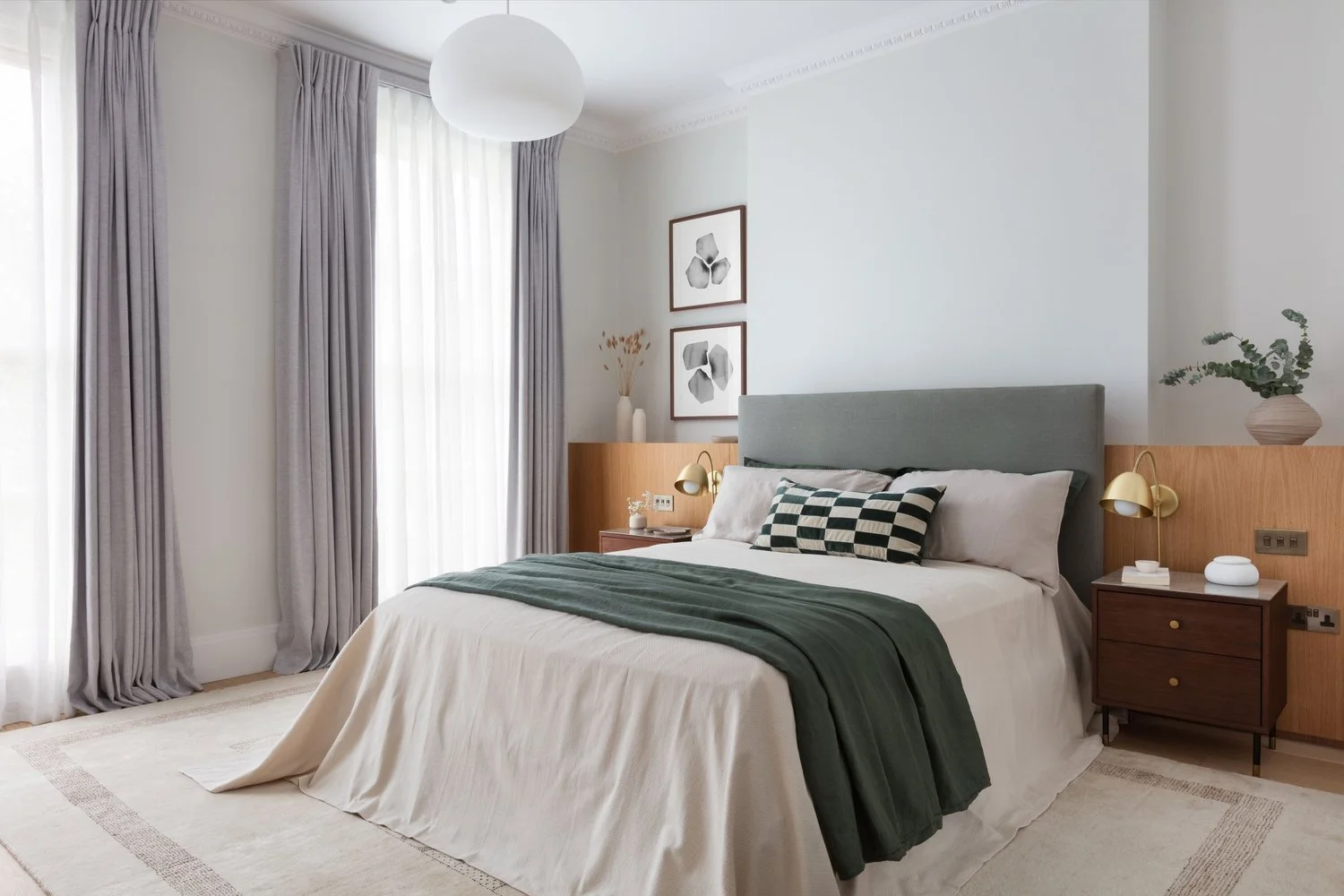 Soft green in the bedroom. Deep blue in the bathroom. Colour changes the mood.